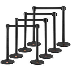 Set of eight black plastic crowd control stanchions with retractable 6.5-foot black belts and weighted bases.
