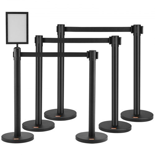 Bostome 6-pack crowd control stanchions with retractable belts and stable metal bases.