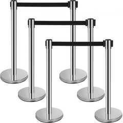 Six stainless steel stanchions with 2m black retractable belts and round bases.