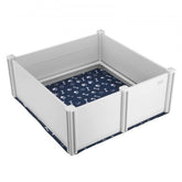 White PVC dog whelping box, 48x48x18 inches, with rails and blue paw-print pee pad.