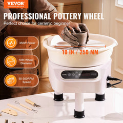 A white 10-inch electric pottery wheel with 350W motor, foot pedal, LCD panel, and clay-shaping tools on a table.
