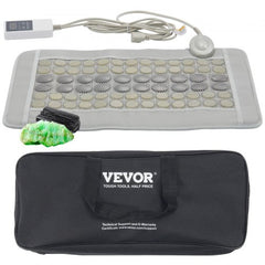 A gray heating pad with jade and tourmaline stones, a controller, and a black carrying bag.