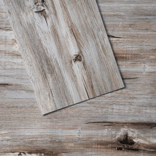 Bostome Vintage Wood Grain Peel & Stick Vinyl Floor Tile in 36x6 inch with wood grain texture.