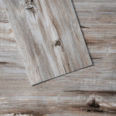 Bostome Vintage Wood Grain Peel & Stick Vinyl Floor Tile in 36x6 inch with wood grain texture.
