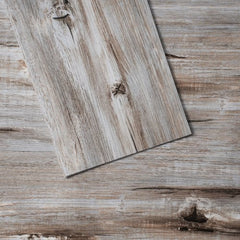Bostome Vintage Wood Grain Peel & Stick Vinyl Floor Tile in 36x6 inch with wood grain texture.