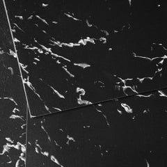 Black marble peel and stick vinyl floor tiles, 12x12 inch, in a 50 pack.