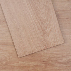 Bostome Peel & Stick Vinyl Floor Tiles feature a wood grain design, measuring 36x6 inches.
