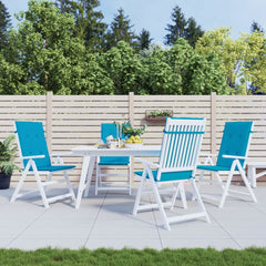 Four Bostome blue polyester highback chair cushions, 47x20in, on white patio chairs around a table.