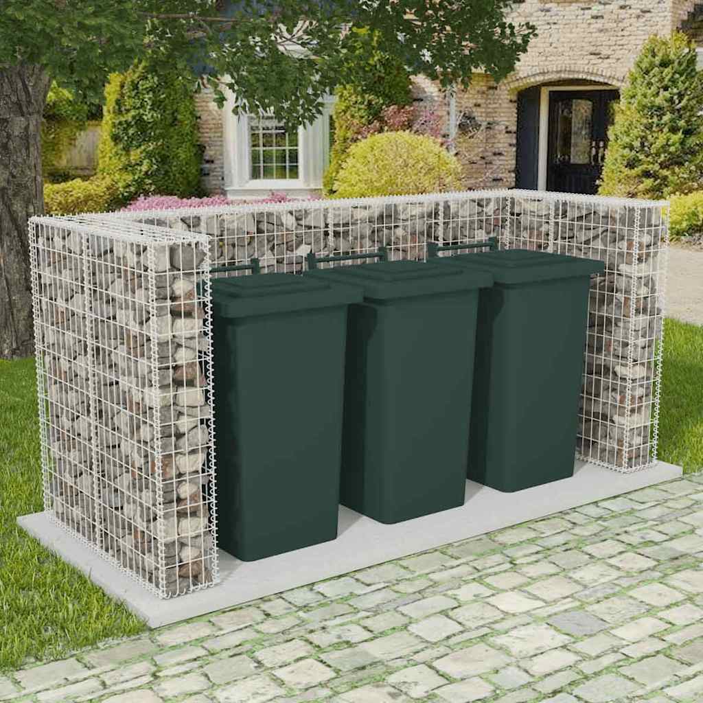 Galvanized steel gabion surround enclosing three green wheelie bins in a garden setting.