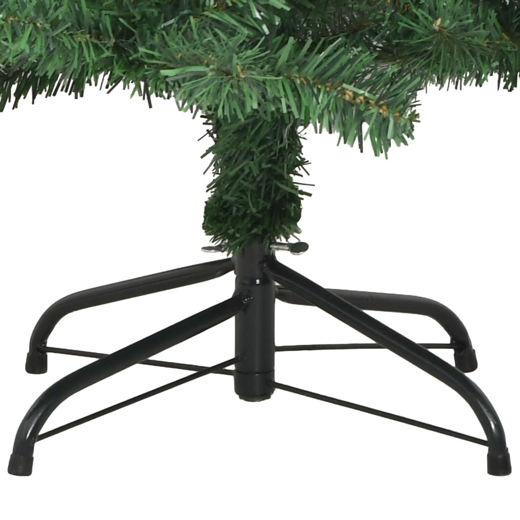An 8-foot green artificial Christmas tree with 1300 PVC branches on a black metal stand.
