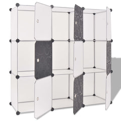 9-compartment black and white storage cube organizer with open doors.