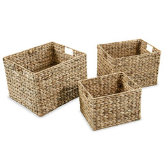 Set of three brown water hyacinth storage baskets in small, medium, and large sizes.