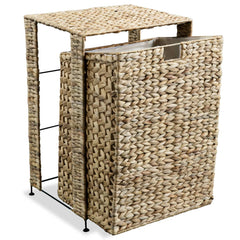 Brown woven water hyacinth laundry basket with metal frame and removable liner.