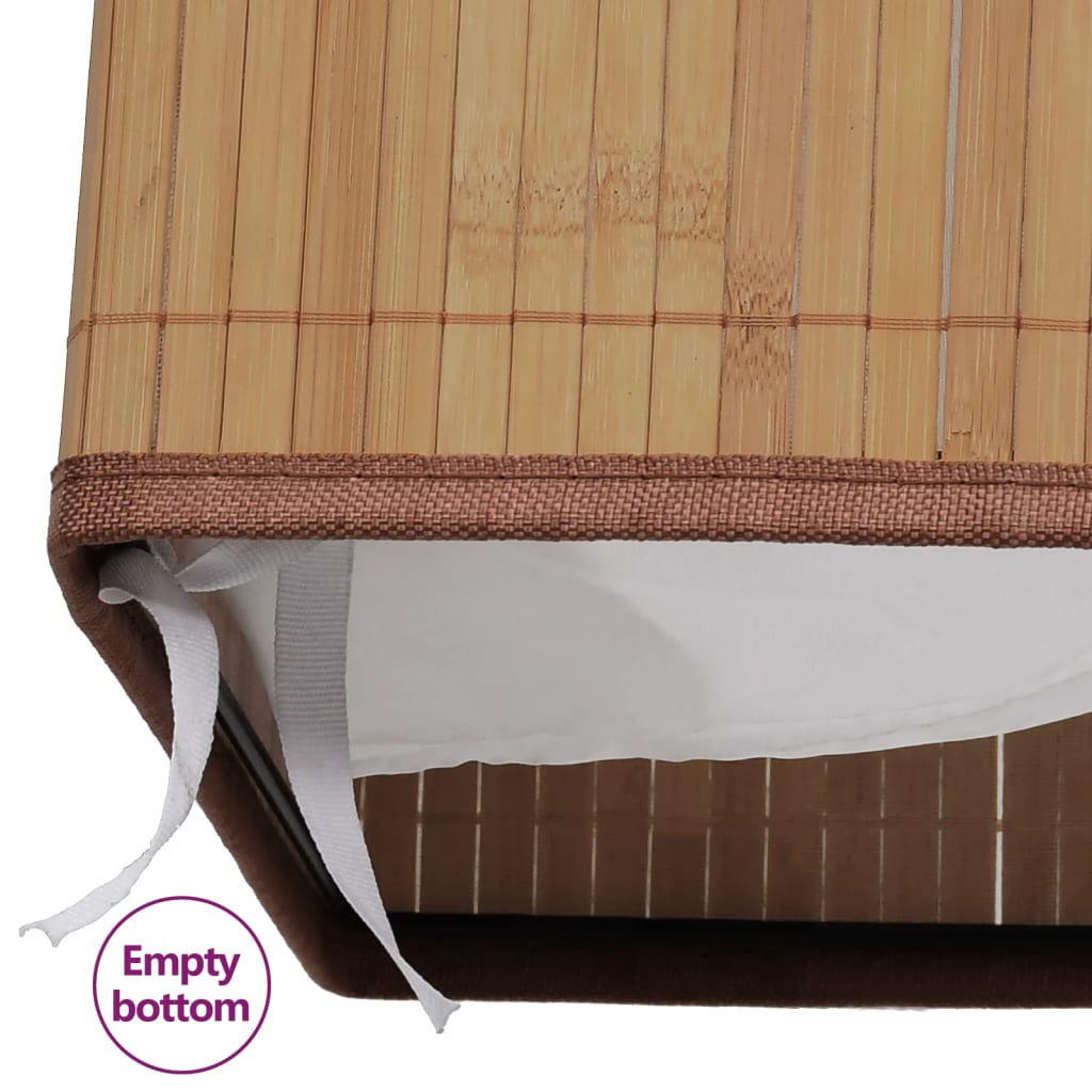 Natural bamboo rectangular laundry hamper with white removable liner and empty interior.