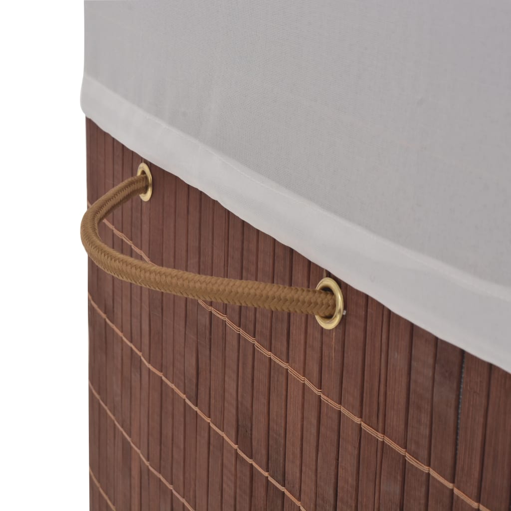 Brown rectangular bamboo laundry hamper with white liner and rope handles.