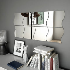 Eight interlocking wave-shaped frameless glass wall mirrors, each 7.9 by 7.9 inches, mounted on a gray wall.