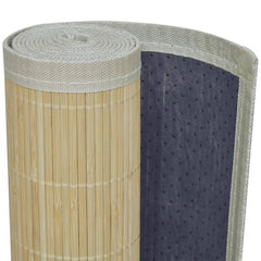 Rolled natural bamboo area rug with gray non-slip backing and borders.