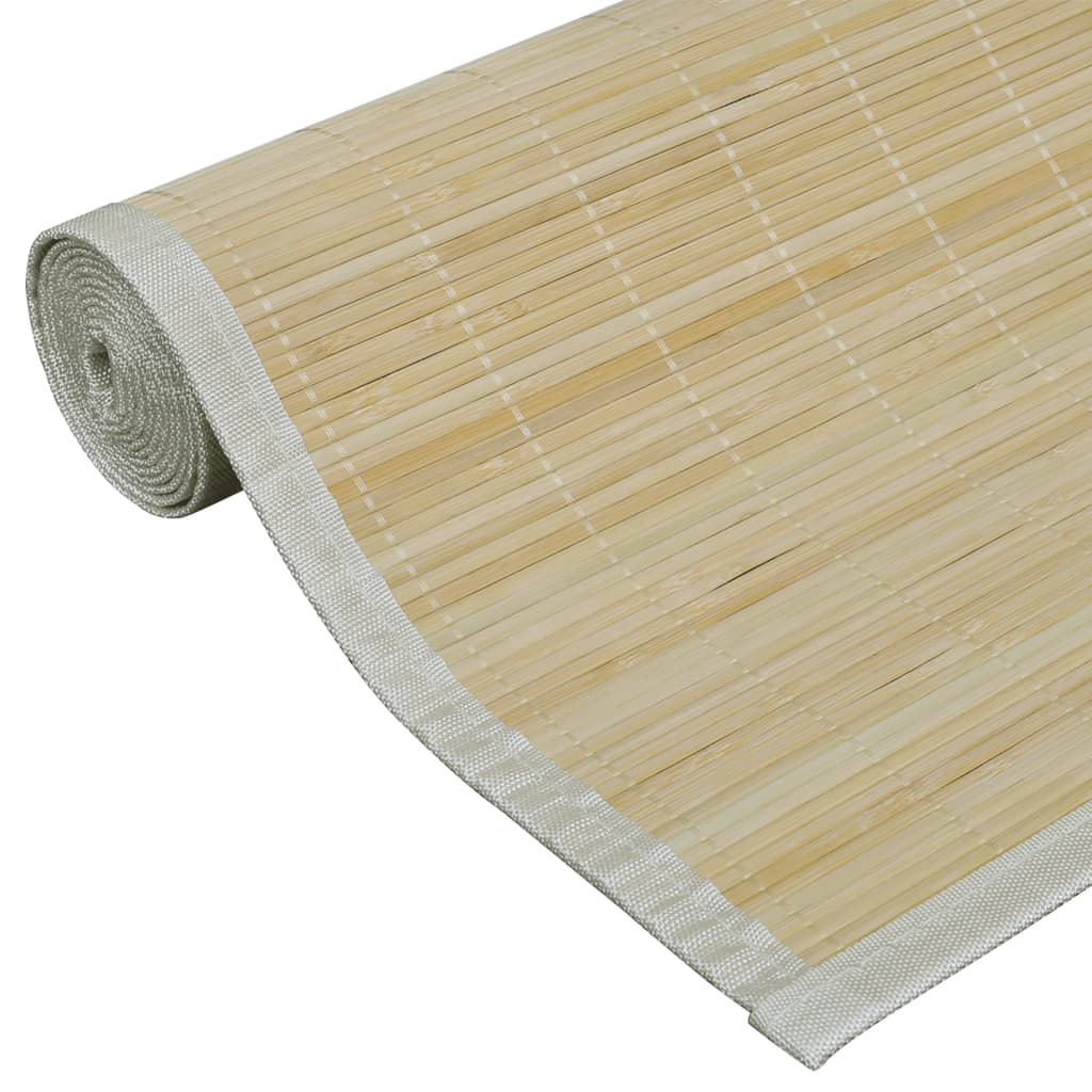 Rolled natural bamboo area rug with light gray edges and non-slip backing, 63x90.6 inches.