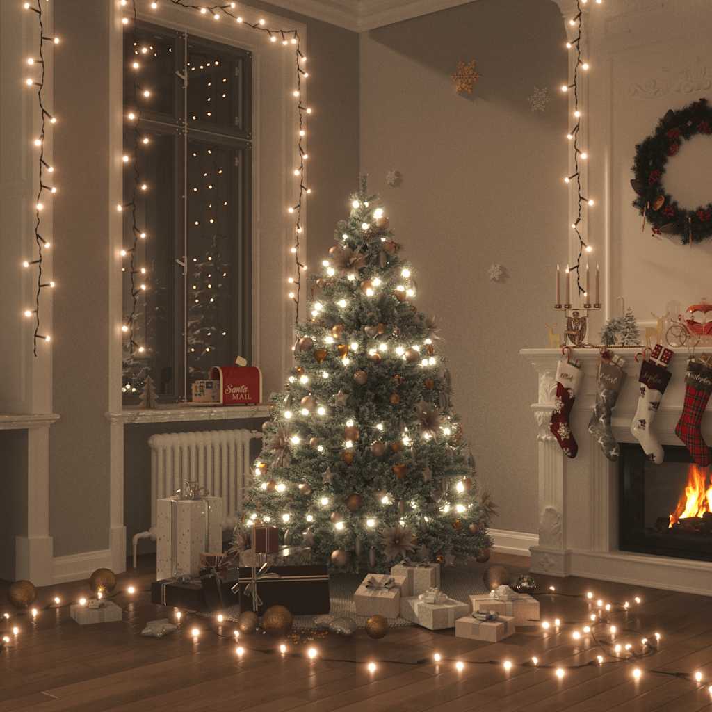 Cozy living room decorated with 131ft warm white LED string lights on tree and walls.