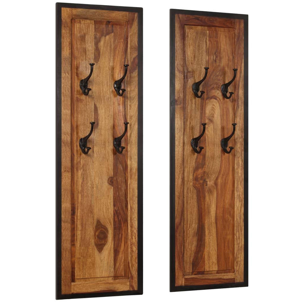 Two tall solid sheesham wood coat racks, each with four black hooks.