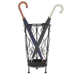 Black vintage-style metal umbrella stand with scrollwork, holding two umbrellas and a drip tray.