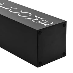 Black powder-coated steel umbrella stand with drip tray, 19 inches tall.