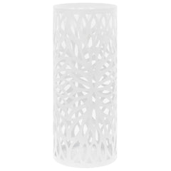 White steel umbrella stand with leaf cutouts and drip tray.