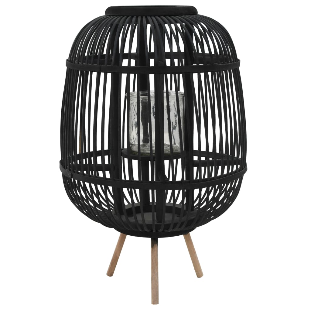 Black bamboo freestanding lantern holder with glass candle jar and wooden feet.