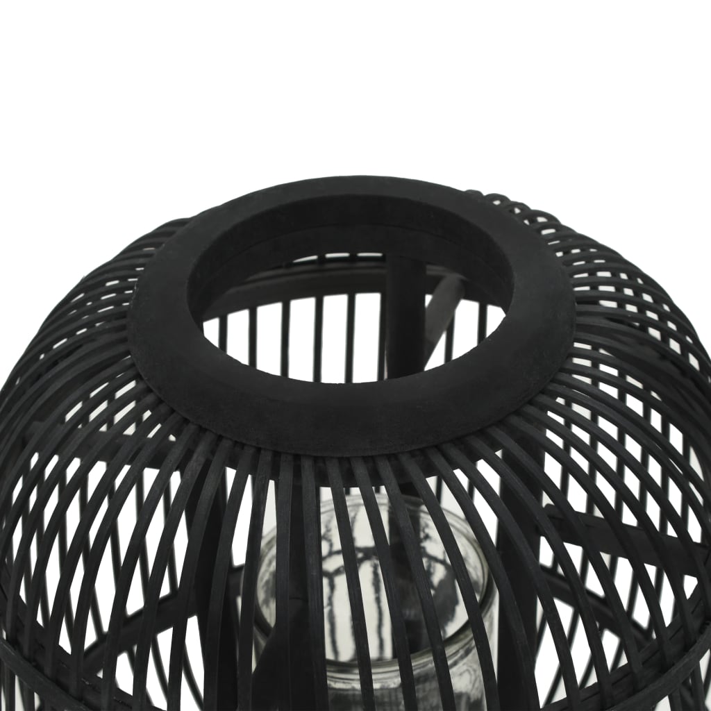 Black bamboo freestanding candle lantern holder with glass jar and woven design.