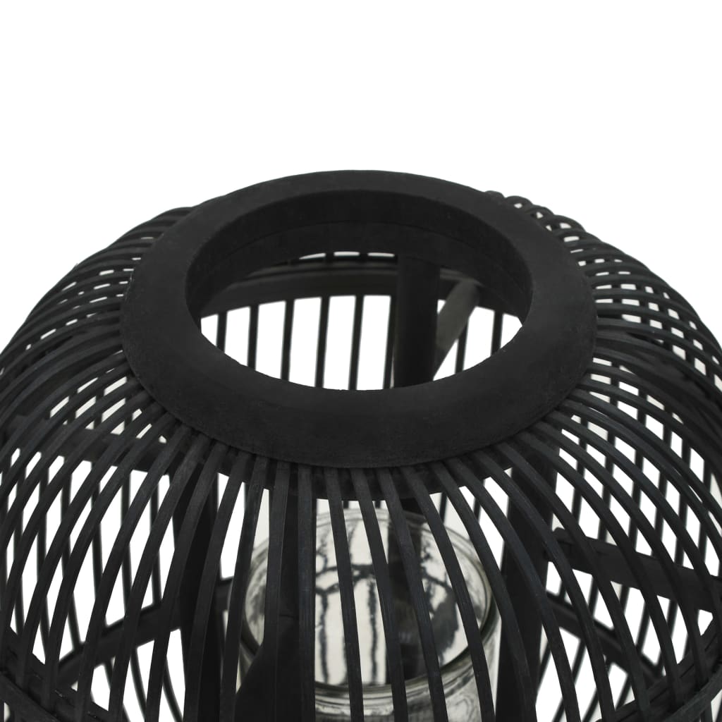 Black bamboo freestanding candle lantern holder with glass jar and wooden base.