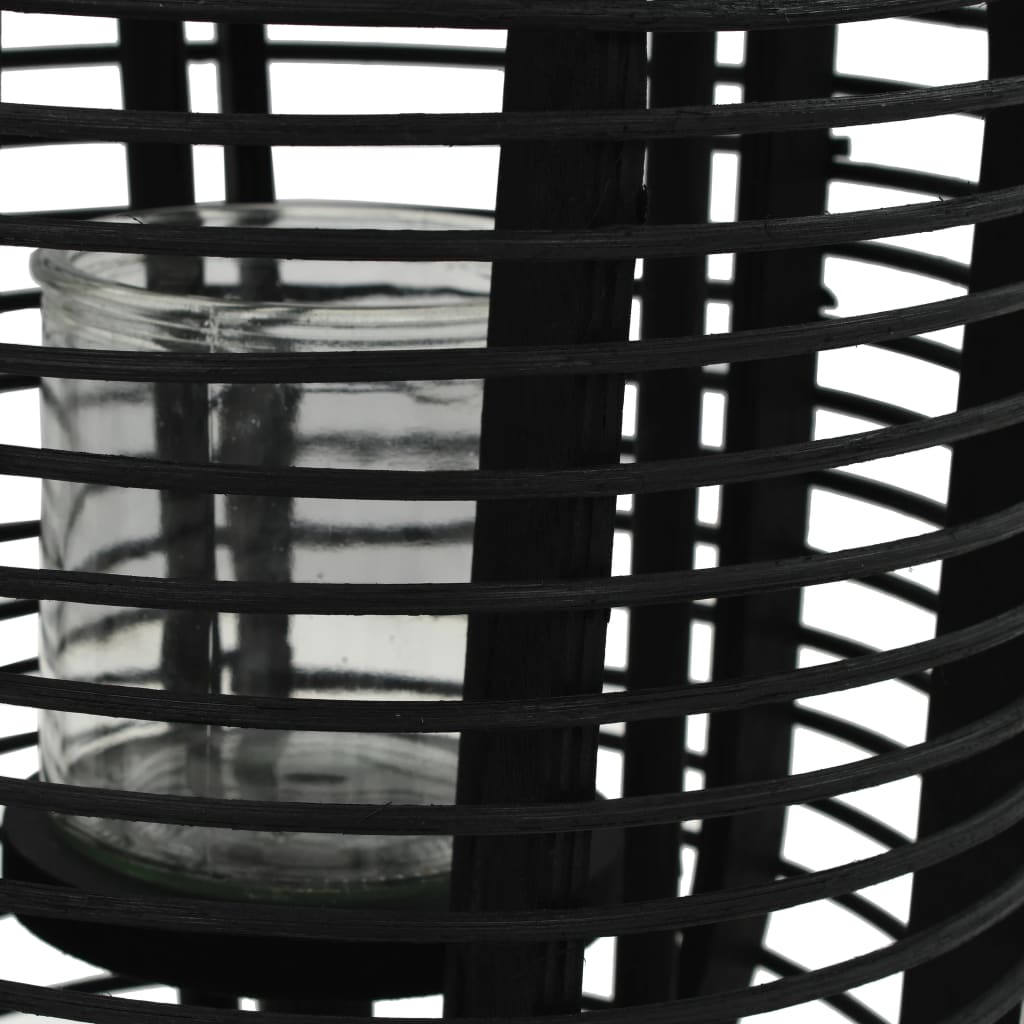 Black bamboo freestanding candle lantern holder with glass jar and lattice frame.