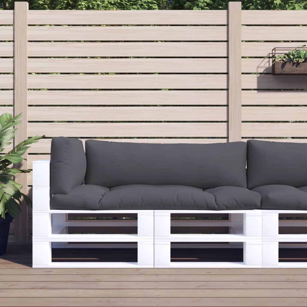 Three-piece gray polyester pallet cushions on a white pallet sofa outdoors.