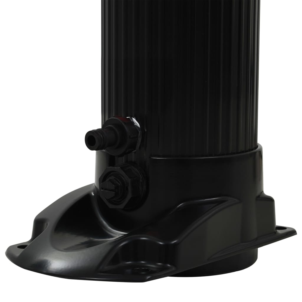 A close-up of the black base of a solar pool shower with hose connections.