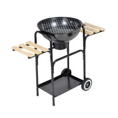 Black steel charcoal kettle barbecue with wooden side shelves and wheels.