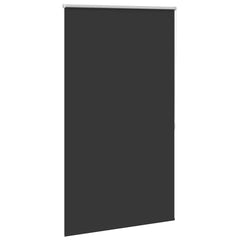 Blackout roller blind in black with a white top rail and pull chain.