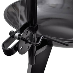 Black steel tripod charcoal BBQ stand with adjustable hanging grill and chain mechanism.