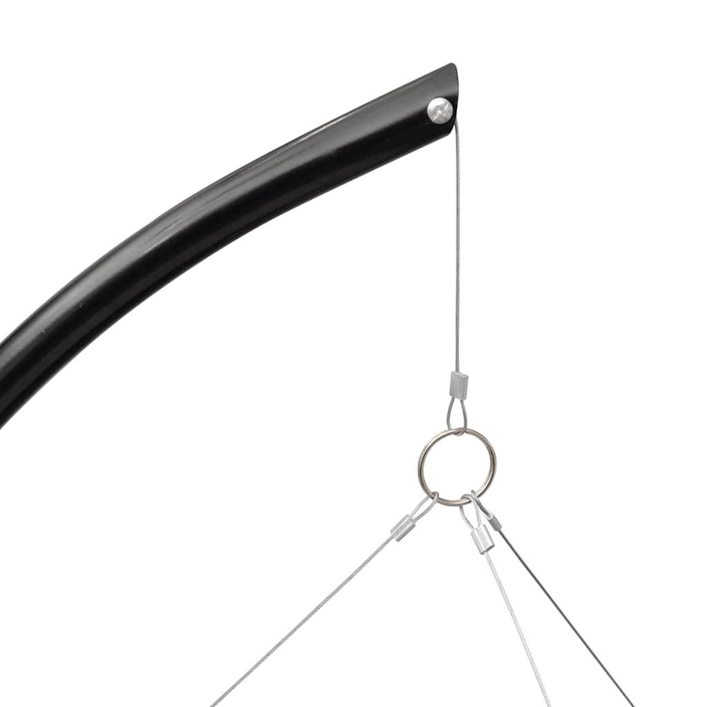 Steel tripod stand with adjustable hanging grill for charcoal BBQ.