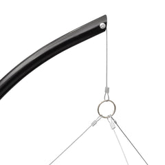 Steel tripod stand with adjustable hanging grill for charcoal BBQ.