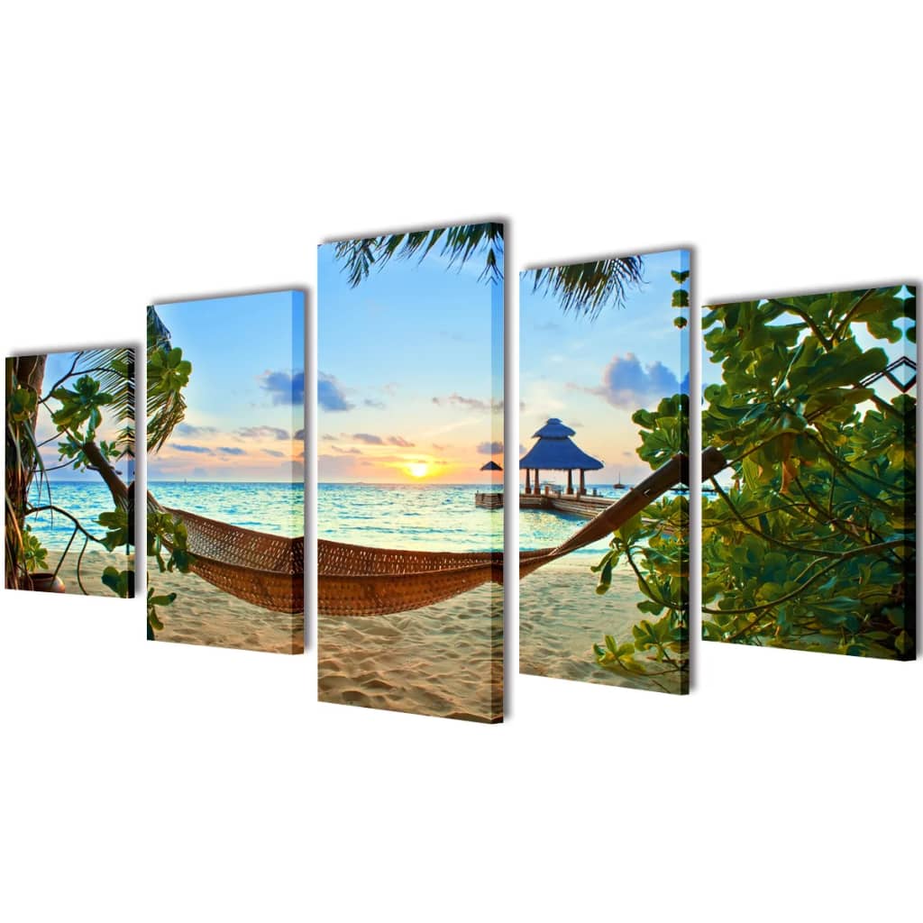 5-panel canvas wall art set depicting a hammock on a sandy beach with a tropical sunset and pavilion.