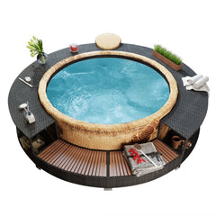 Black poly rattan hot tub surround with storage shelves and ledges around a blue spa.