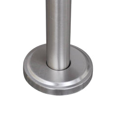 Close-up of the stainless steel base and post of a double mailbox stand.
