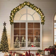 16ft Christmas garland with warm white LED lights draped over a window.