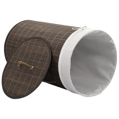 Dark brown round bamboo laundry hamper with removable liner and sturdy handles.