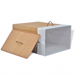 Rectangular natural bamboo laundry hamper with lid and white liner.