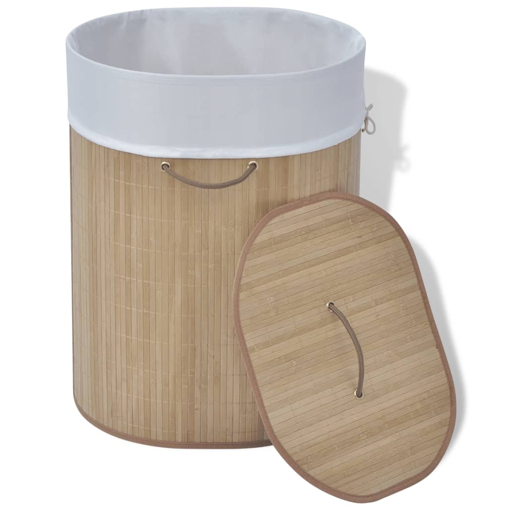 Oval bamboo laundry hamper with white liner and removable lid with handle.
