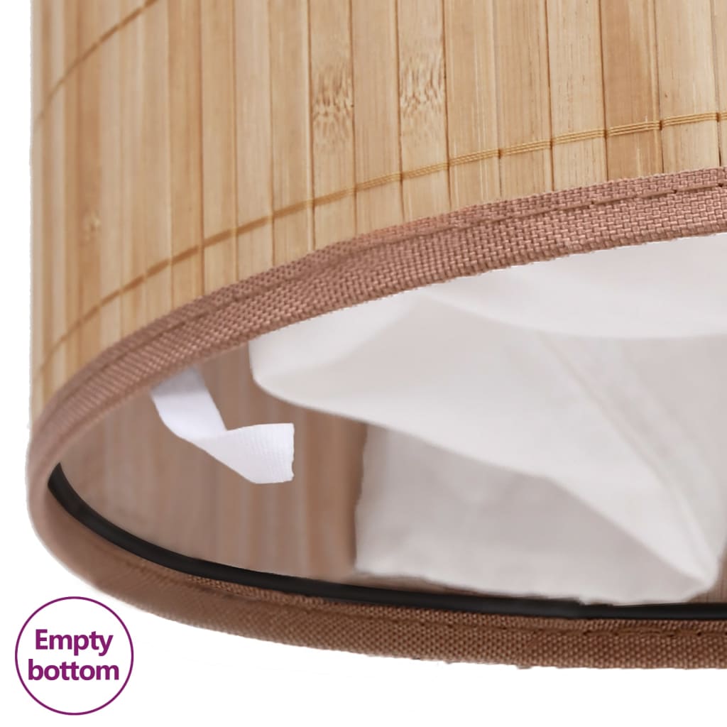 Oval natural bamboo laundry hamper with removable white liner.