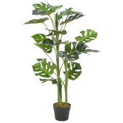 Artificial green Monstera plant, 39.4 inches high, in black pot with variegated leaves.