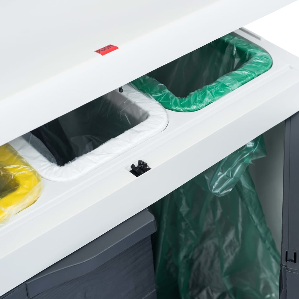 Dark gray plastic garden dustbin with three open compartments holding yellow, green, and clear bags.
