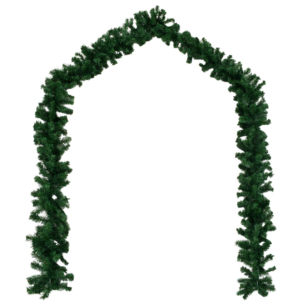 Four green PVC Christmas garlands arranged in an arch shape.