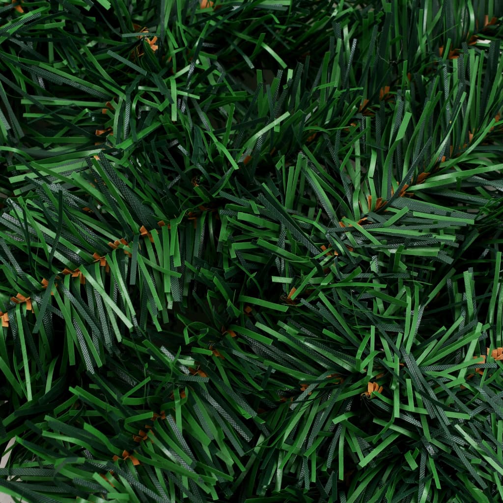 Close-up of green PVC Christmas garland with colorful baubles.